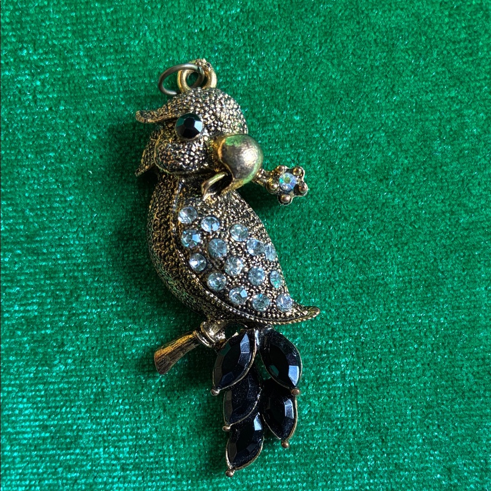 Vintage parrot pendant in gold tone with black & white crystals costume jewelry